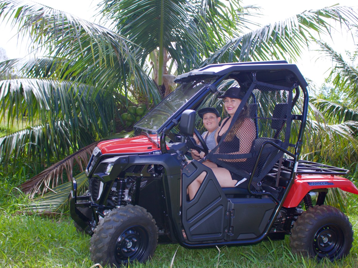 mom and son in ATV