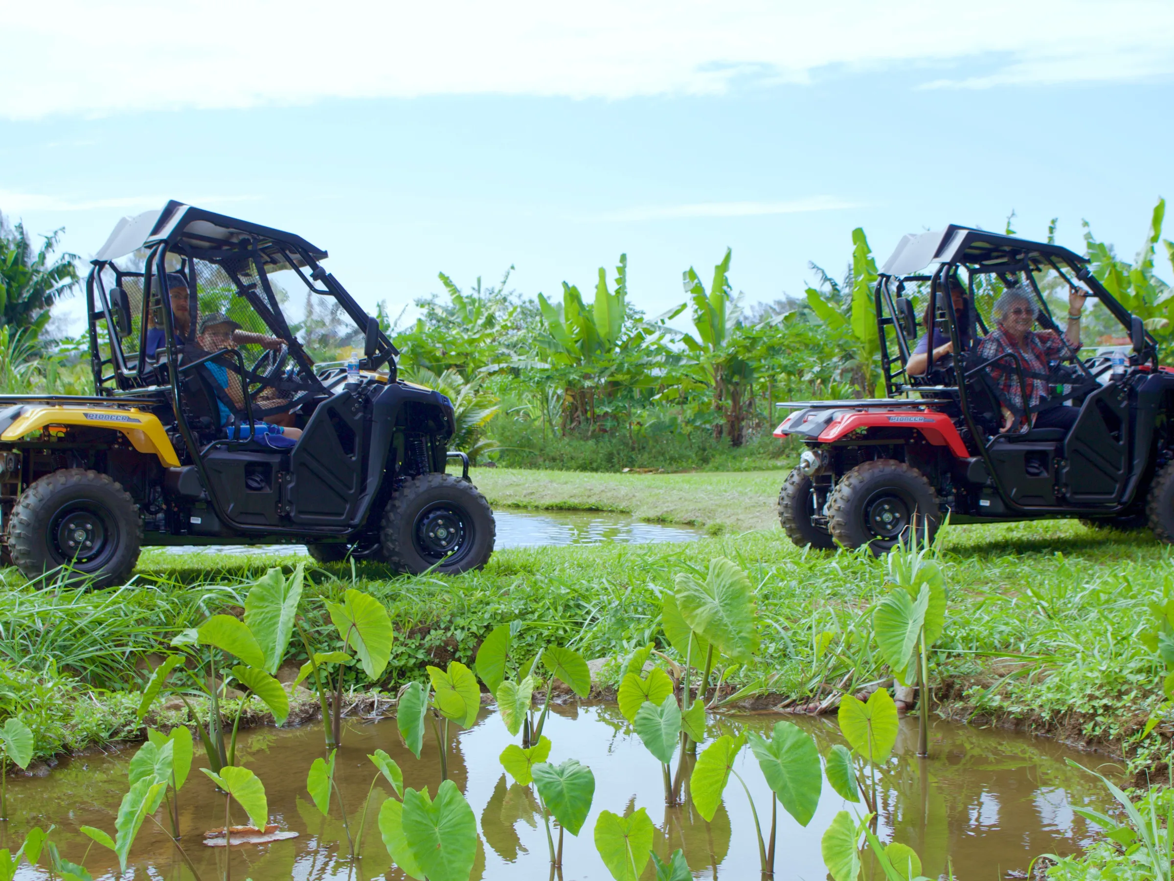 family riding in ATV